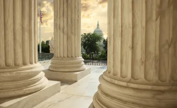 Viewing the U.S. Capitol from portico of the U.S. Supreme Court