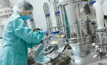 Scientist working in a biomanufacturing lab