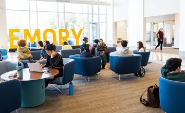 Lounge at Emory University with students meeting and studying