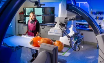 Kelsey Nicole Sommer, QAS.AI chief operating officer and doctoral student, works inside the UB Canon Stroke & Vascular Research Center.