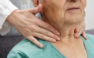 Woman being checked for thyroid problems