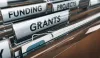 File folders labelled "grants," "funding," and "projects."