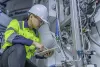 Electrical engineer working in a control room. 