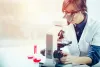 Woman looking into microscope