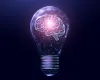 Wireframe polygonal human brain in a lightbulb. 